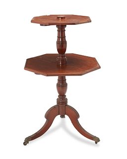 An English drop-leaf tiered mahogany table