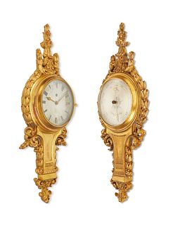 A near-pair French wall clock and barometer set