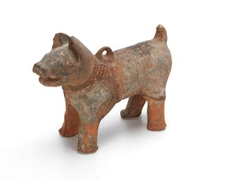 A Chinese glazed pottery model of a dog