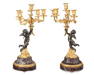 A pair of Louis XV-style gilt-bronze and marble candelabra