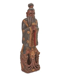 A Chinese polychromed wood sculpture of a scholar