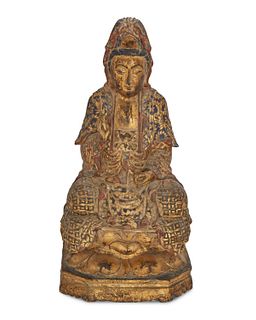 A polychrome and giltwood Buddha sculpture