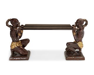 A figural bronze console table