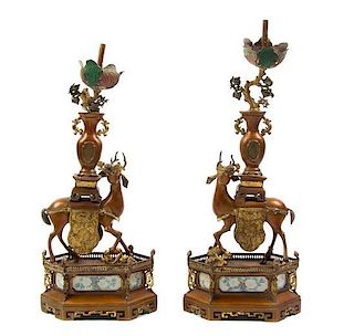 A Pair of Chinese Export Patinated Metal Figural Candlesticks, Height 16 3/4 inches.