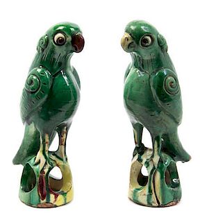 A Pair of Chinese Ceramic Models of Parrots, Height 8 inches.