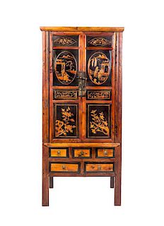 A Chinese Lacquered Cabinet, Height 67 5/8 x 31 1/4 x depth 21 1/8 inches.