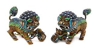 A Pair of Chinese Enameled Silver Figures of Temple Lions, Width of wider 4 1/2 inches.