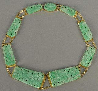 20K gold and carved light green jade necklace, jade panels carved with birds, flowers, and vines. 
lg. 16in.