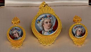 18K-20K and French enamel suite comprising of a brooch and a pair of earrings, each having enameled portrait of maiden mounte