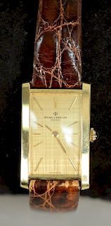 Baume & Mercier 18K rectangular wristwatch with brown alligator strap with box.