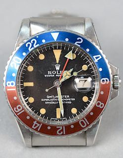 Rolex stainless steel wristwatch GMT Master model 1675, sn-2013101 with original box and papers.
