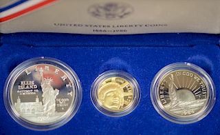 U.S. 1986 Liberty three proof coins including gold five dollar 8.359 grams .900 fine, proof silver dollar 26.73 grams .900 fi