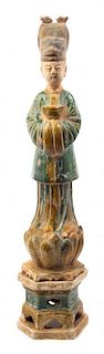 A Tang Style Pottery Figure, Height 25 inches.