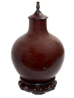 A Chinese Sang de Boeuf Bottle Vase, Height 10 1/2 inches.