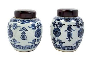 A Pair of Chinese Ginger Jars, Height 7 inches.