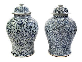A Pair of Blue and White Jars and Covers, Height 16 inches.