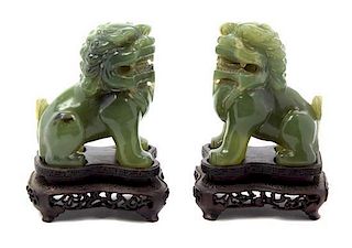 Two Carved Stone Models of Shishi Lions, Width 3 inches.