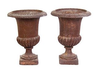 A Pair of Victorian Style Cast Iron Urns, Height 11 3/4 inches.