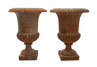 A Pair of Victorian Style Cast Iron Urns, Height 11 1/2 inches.