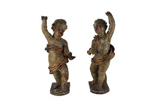 Pair of Carved and Painted Wooden Cherubs