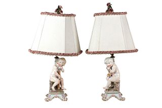 Pair of Painted Porcelain Cherub Lamps