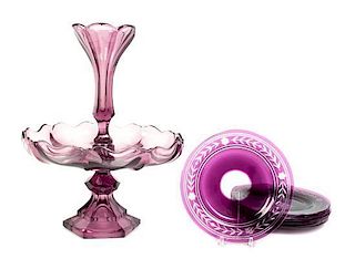 A Victorian Amethyst Glass Epergne, Height of first 14 3/4 inches.