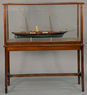 Corsair ship model in mahogany and glass case on mahogany stand, marked on plaque: American Steam Yacht "Corsair" of 1899 own