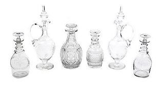 A Collection of Six Cut or Etched Glass Decanters, Height of tallest 13 1/2 inches.