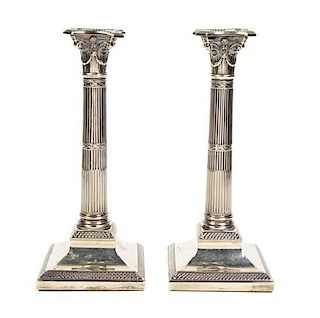 A Pair of English Silver-Plate Candlesticks, Height 11 1/4 inches.