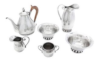 Six Hand Hammered Pewter Serving Articles, Width of widest 8 inches.