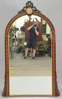 Victorian rosewood pier mirror having hand painted porcelain plaque with incised gilt carved ribbon.  81" x 42"