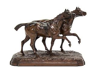 A Cast Metal Equestrian Group, Width 7 inches.