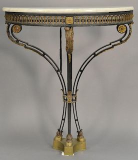 Iron demilune marble top console table with gilt bronze and brass mounts and hoof feet. ht. 38in., wd. 32in., dp. 14in.