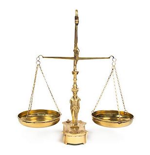 An Empire Style Brass Balance Scale, Height overall 15 5/8 inches.