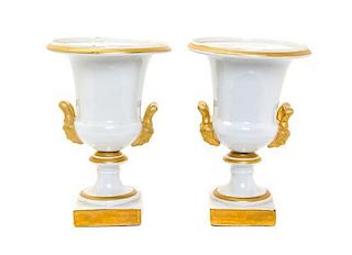 A Pair of Paris Style Porcelain Urns, Height overall 28 inches.