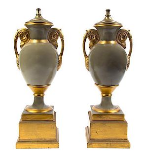 A Pair of Paris Porcelain Style Urns, Height overall 33 inches.