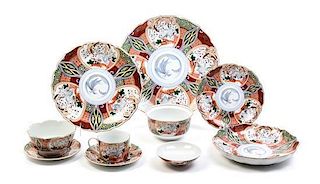 An Imari Style Porcelain Dinner Service, Diameter of plates 10 inches.