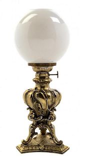 An American Gilt Metal Fluid Lamp, Kosmos, Height overall 16 inches.