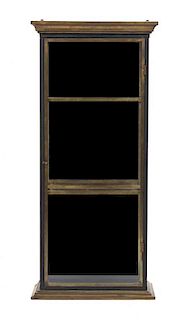 A Brass Table Vitrine, Height 36 1/4 x width 16 1/4 x depth 8 1/2 inches.