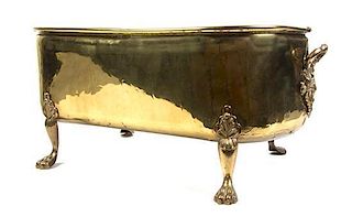 A Brass Jardiniere, Width 26 inches.
