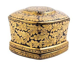A Gilt Decorated Lacquered Box, Width 7 3/4 inches.
