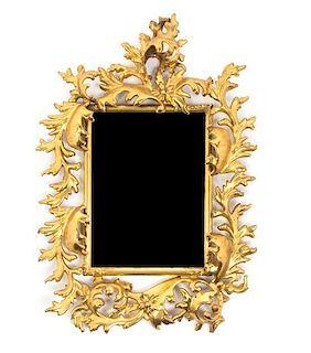 A Baroque Style Gilt Metal Wall Mirror, 15 x 10 1/2 inches.