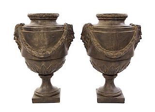 A Pair of Neoclassical Style Plaster Urns, Height 31 1/2 inches.
