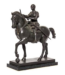 A Continental Cast Metal Equestrian Figure, Width 15 1/2 inches.