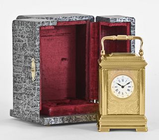 A fine mignonnette #1 carriage clock with portrait panels and travel case