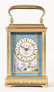 A good later 19th century French striking carriage clock with polychrome porcelain panels