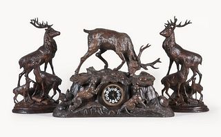 Black Forest three piece hand carved mantel clock garniture with stag