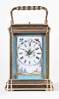 A very attractive 19th century French carriage clock with polychrome porcelain panels