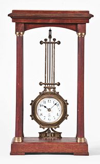 An early 20th century swinging mystery clock by Gustav Becker