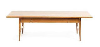 A Paul McCobb Maple Planner Group Low Table, for Wichendon, Height 16 1/4 x width 54 x depth 20 inches.